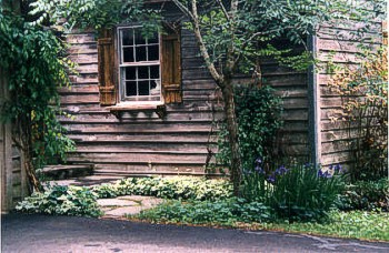 Country Window Shutters and back entrance
